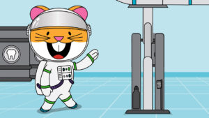 Bitsy wearing an astronaut's uniform